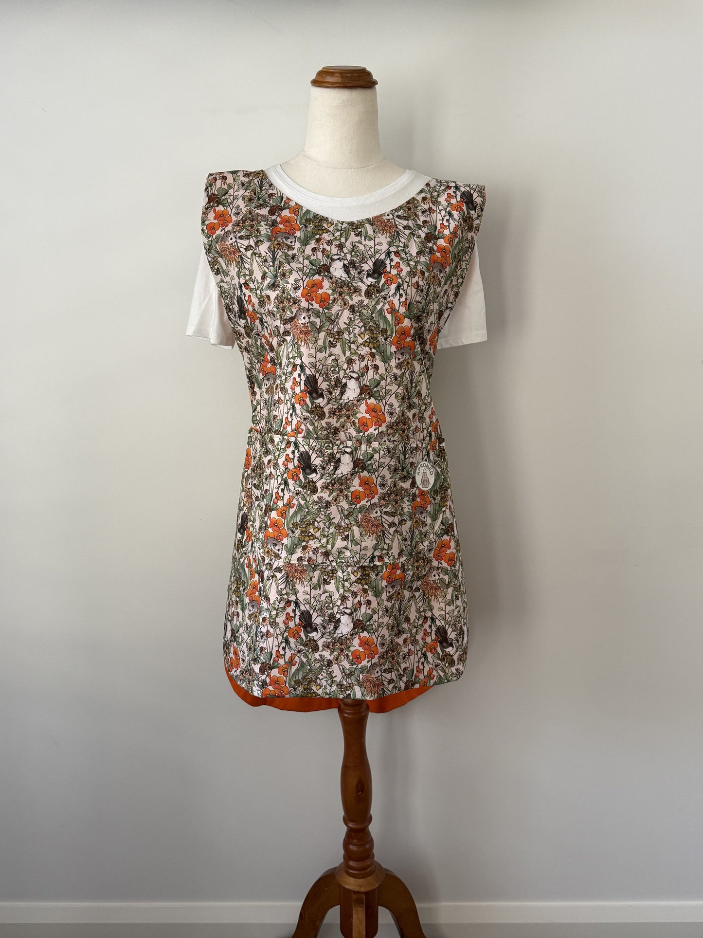Orange Natives Pinny front