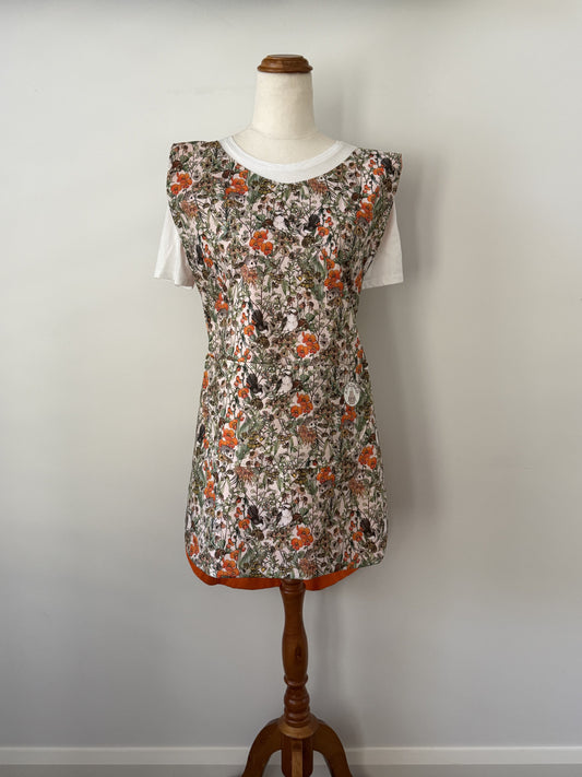 Orange Natives Pinny front