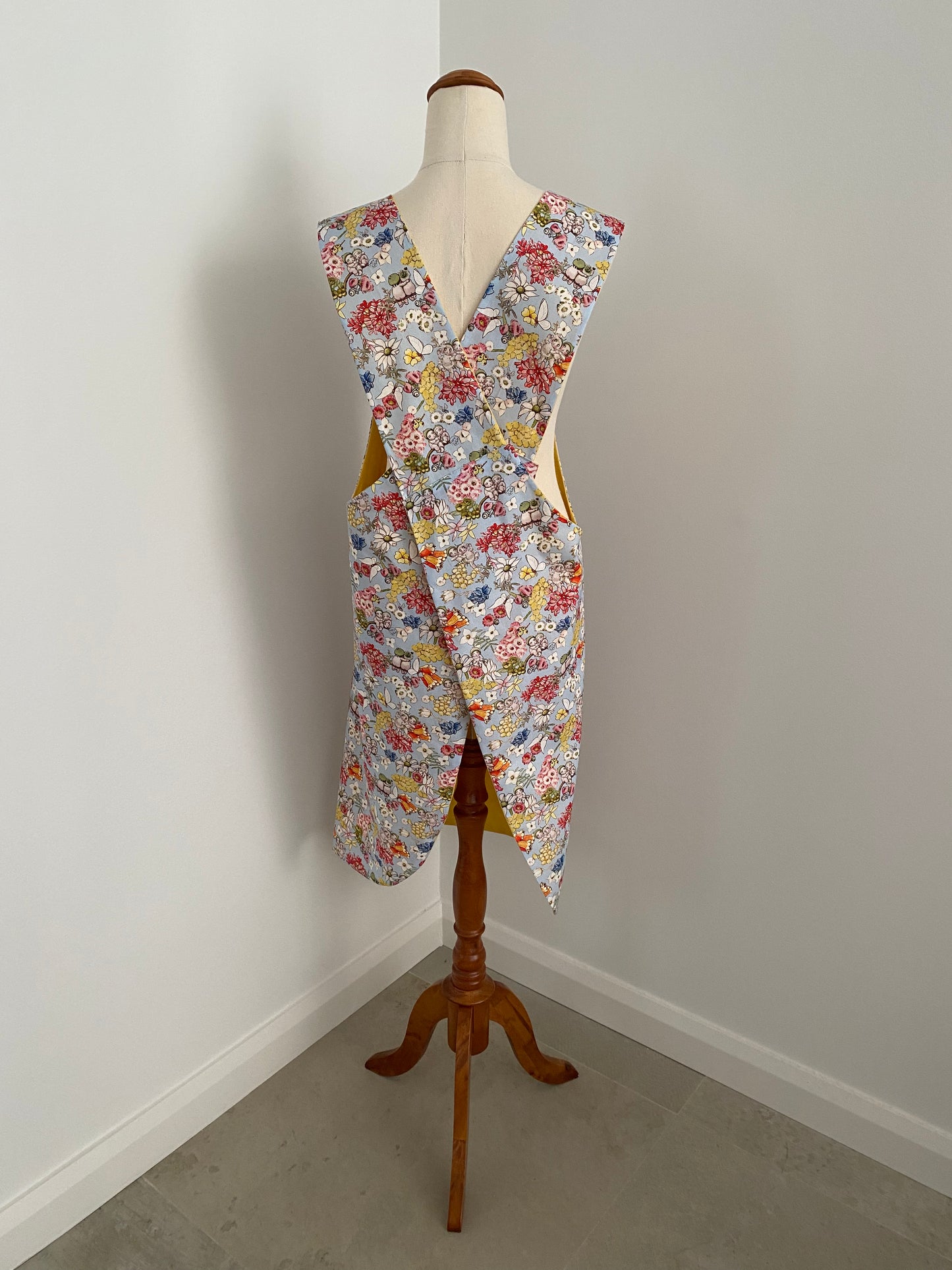 Wrap-Around Apron - Light Blue May Gibbs Fabric